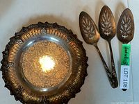overview of silverplate dish and three matching servers