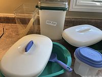 Group shot of all five storage pieces with lids visible