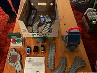 Overview of box with track, engines, shed, accessories