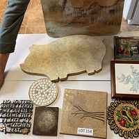 Overview of all ten trivets and tiles on table