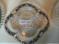 Top view of divided glass pickle dish showing overall form and silver rim