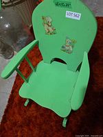 Full view of green wooden kids rocking chair