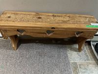 Top and front view of pine bench with heart cut-outs
