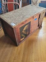 Overview of wooden trunk showing top and side