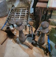 andirons, grate, tool stand visible