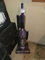 Full view of Dirt Devil Endura Pro upright vacuum with hose and cord