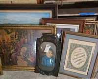 Group shot of all framed artworks leaning together