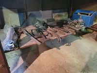 Full view of bottom shelf with tools and blue tote