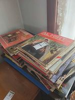 Stack of LPs on shelf, showing variety and sleeve wear