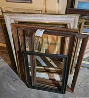 Stack of five frames showing finishes and sizes
