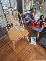 Windsor spindle-back chair beside matching table