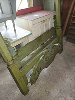 Overall view of headboard and footboard leaning together