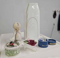 Group shot of all five porcelain items on table