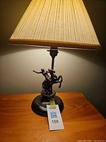 Full lamp showing sculptural base and shade