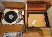 Turntable components in original styrofoam and separate plinth in box