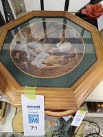 Framed collector plate showing full view with lot tag