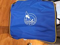 Blue nylon carry bag with Keep A Float logo