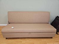 Front view of linen-look loveseat in sofa position