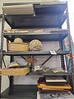 Full shelving unit with variety of items