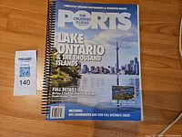 Front cover of the cruising guide showing title, year and spiral binding