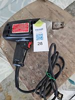 Left side view of Sears Craftsman drill showing model label and power cord