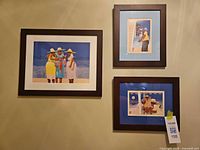 All three framed prints on wall