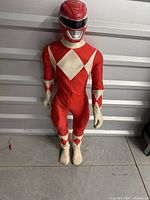 Front view of large Red Ranger figure