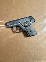 Left side of Dick Tracy plastic cap gun