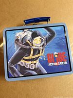 Top view of lunchbox showing graphic and blue trim