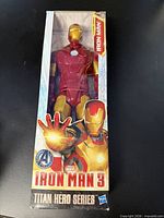 Front view of sealed Iron Man 3 Titan Hero Series action figure box