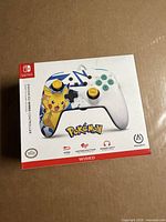 Front of retail box showing Pokémon Pikachu design controller