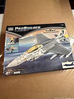 Front of boxed Mega Bloks Tactical Fighter set showing artwork and details