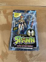 Front view of sealed Spawn Angela figure in blister