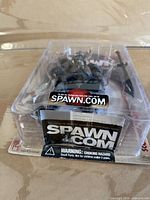 Front angled view of sealed Spawn figure in clamshell packaging
