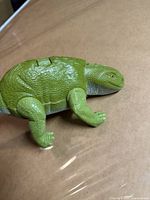 Left side view of green Star Wars reptile figure