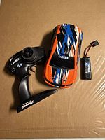 RC car, transmitter and battery grouped