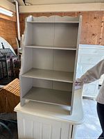 Gray three-tier shelf front