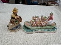 Both Sebastian Miniatures figurines side by side