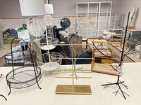 Group shot of all six metal stands on tabletop