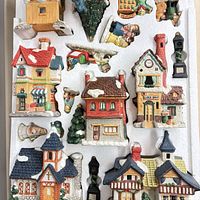 Overall view of porcelain village set in styrofoam tray