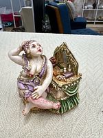 Front view of Mme Josephine trinket box showing figure and vanity