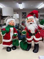 Front view of both dolls standing