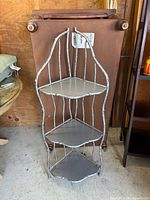 Shelf fully assembled, three tiers visible