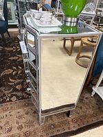 Side view showing mirrored surface and overall height