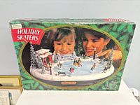 Front of original box showing product image and branding