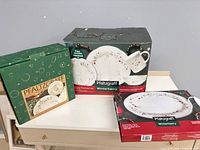 Three boxed Pfaltzgraff Winterberry sets