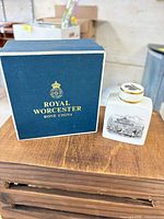 Tea caddy beside Royal Worcester box