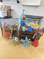 Group shot of all loose figures, plaster submarine, and sealed blister pack