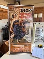 Full view of F. Dick advertising board showing entire artwork and dimensions reference