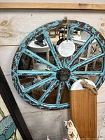 Full view of round wagon wheel mirror